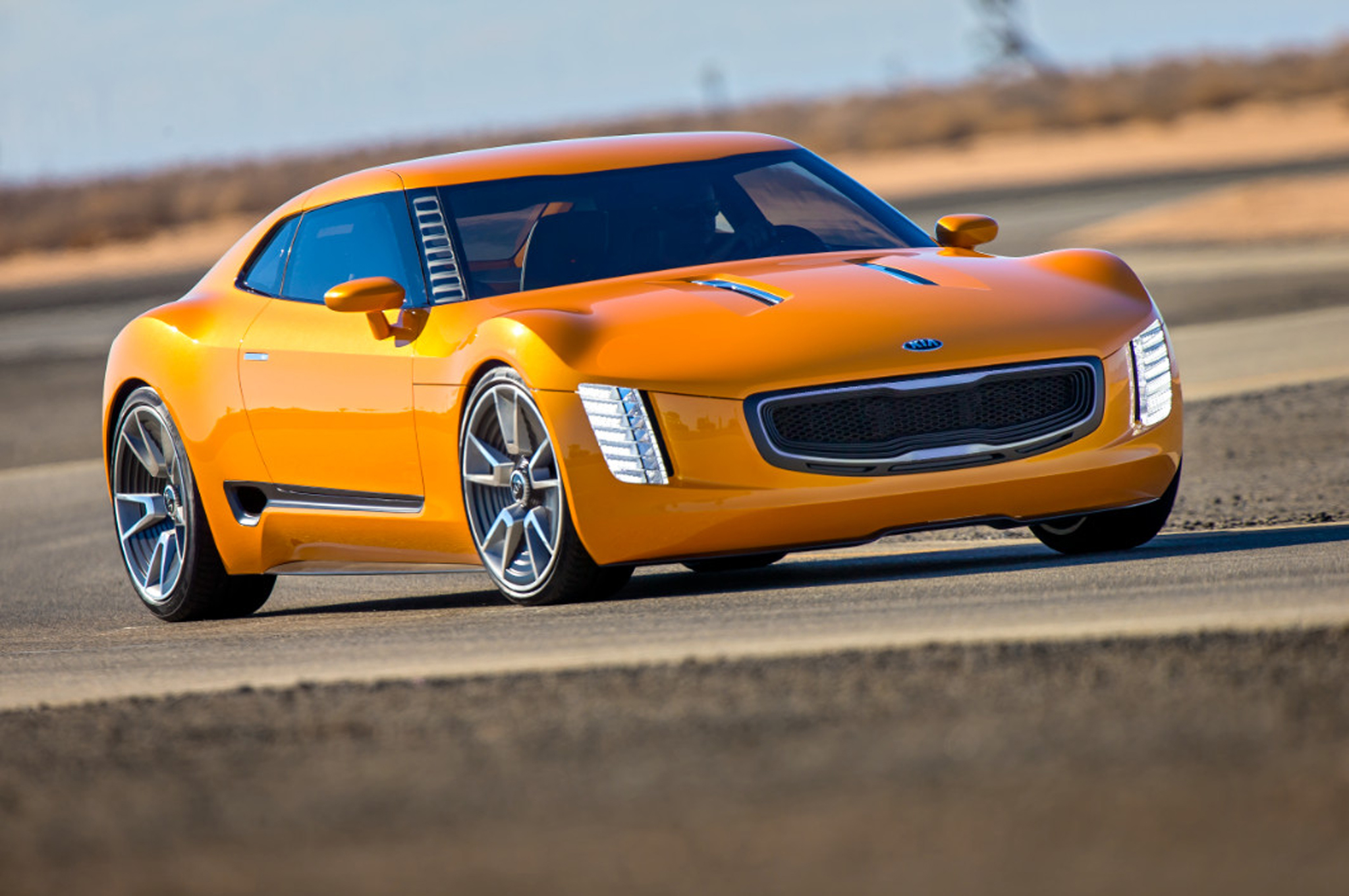 Report Kia Gt Sports Car Debuts This Year Rio Hot Hatch In 2018 Kia Gt4 Stinger Concept Front Three Quarter In Motion 021